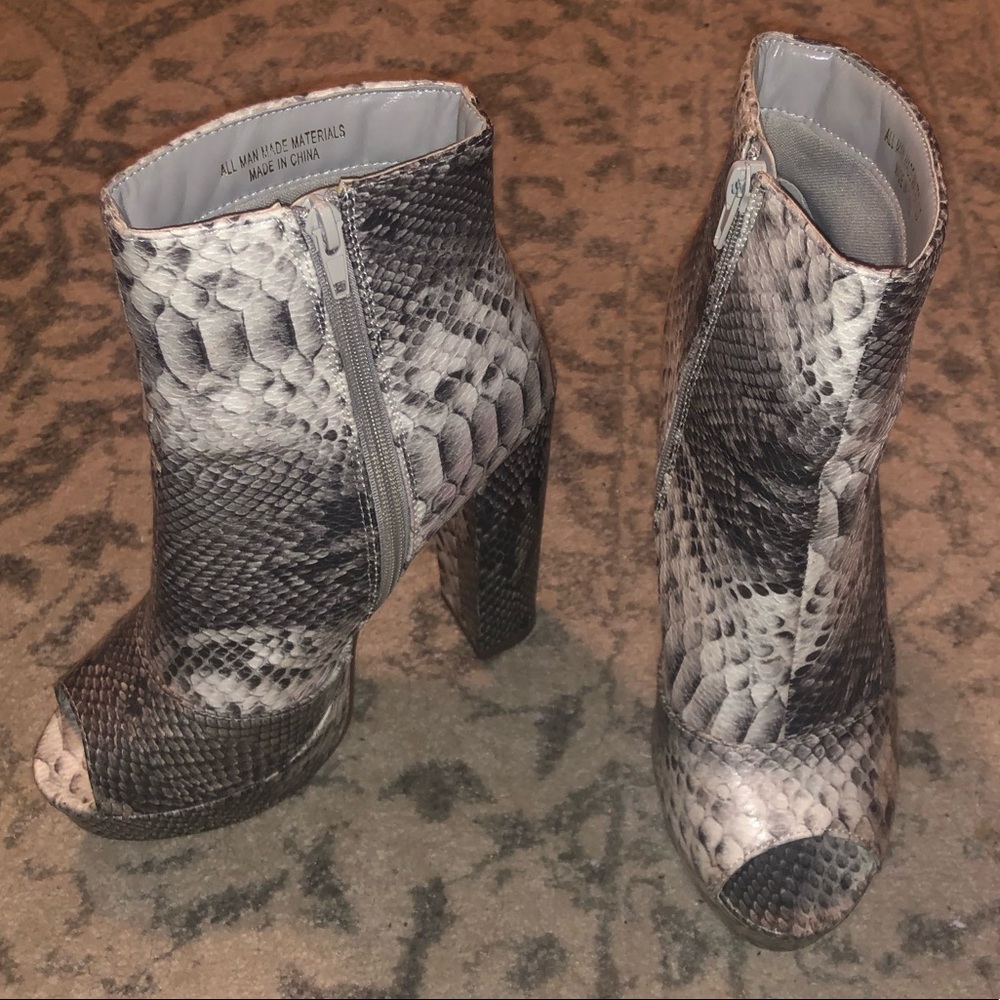 Boutique snakeskin booties